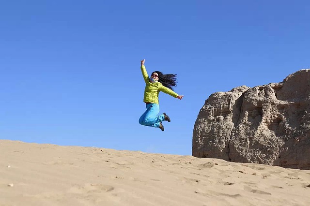 leaping girl on beach