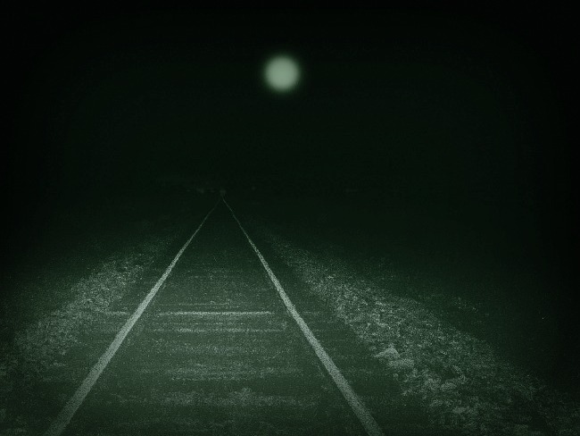 railroad track with mysterios light