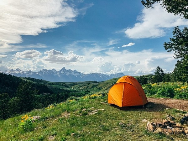 First, find a good camping spot