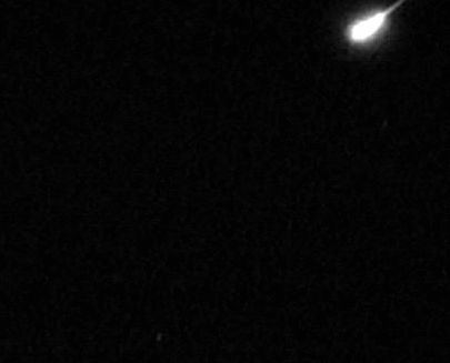A fireball meteor falling earthward, courtesy of NASA/ George Varros. meteor falling courtesy nasa