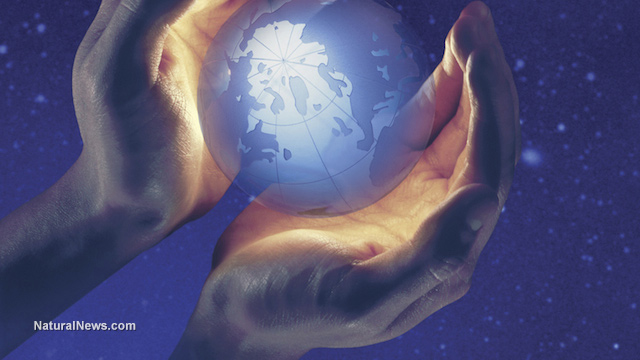 How your psychic senses are connected to Earth's energy concept-hands-palms-earth-globe-light