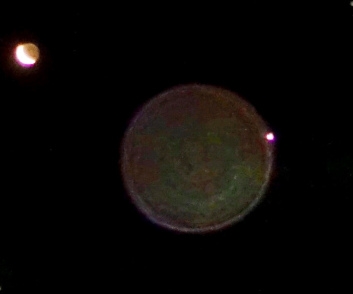Orb radiating from Venus toward the Moon
